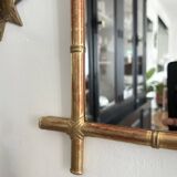 Mirror in gilded stucco, bamboo patina and gold leaf.