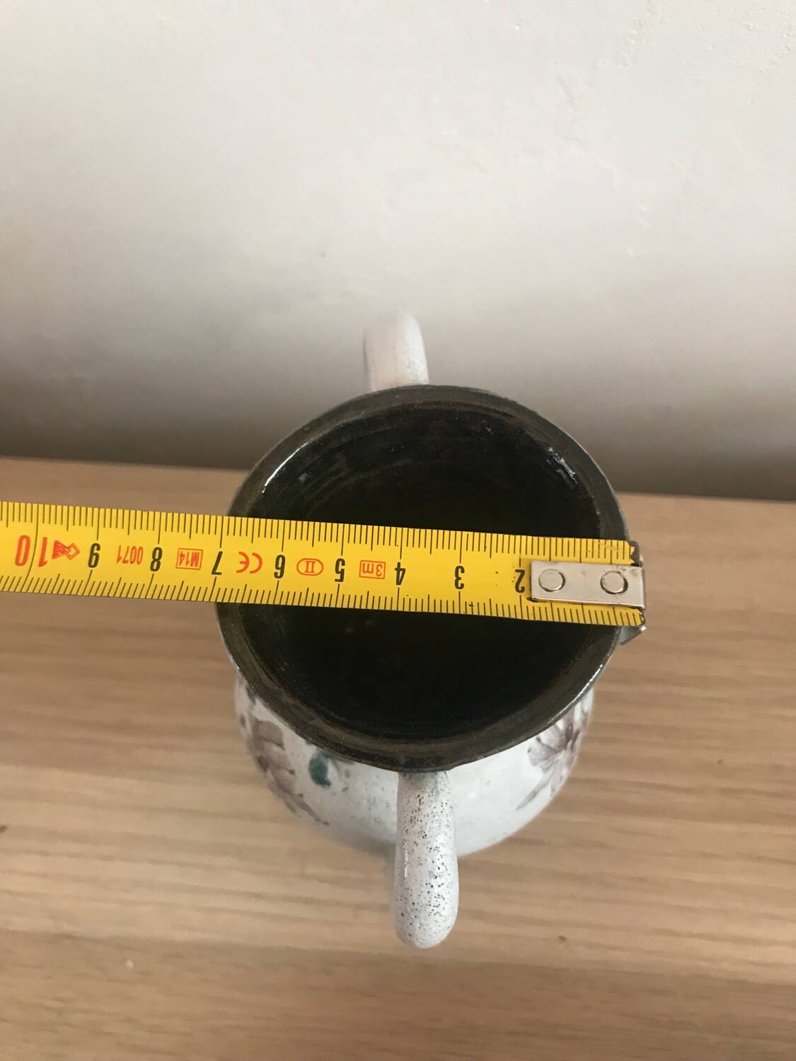 Small stoneware vase with handles and floral motifs Enameled In very good condition