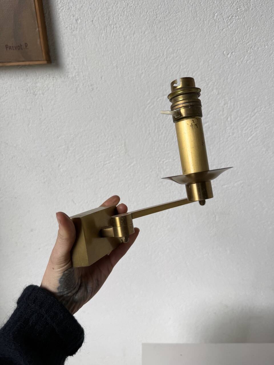 Pair of brass wall lights with articulated arms from the 70s