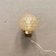 Wall light in rosewood with bobble glass ball shade.