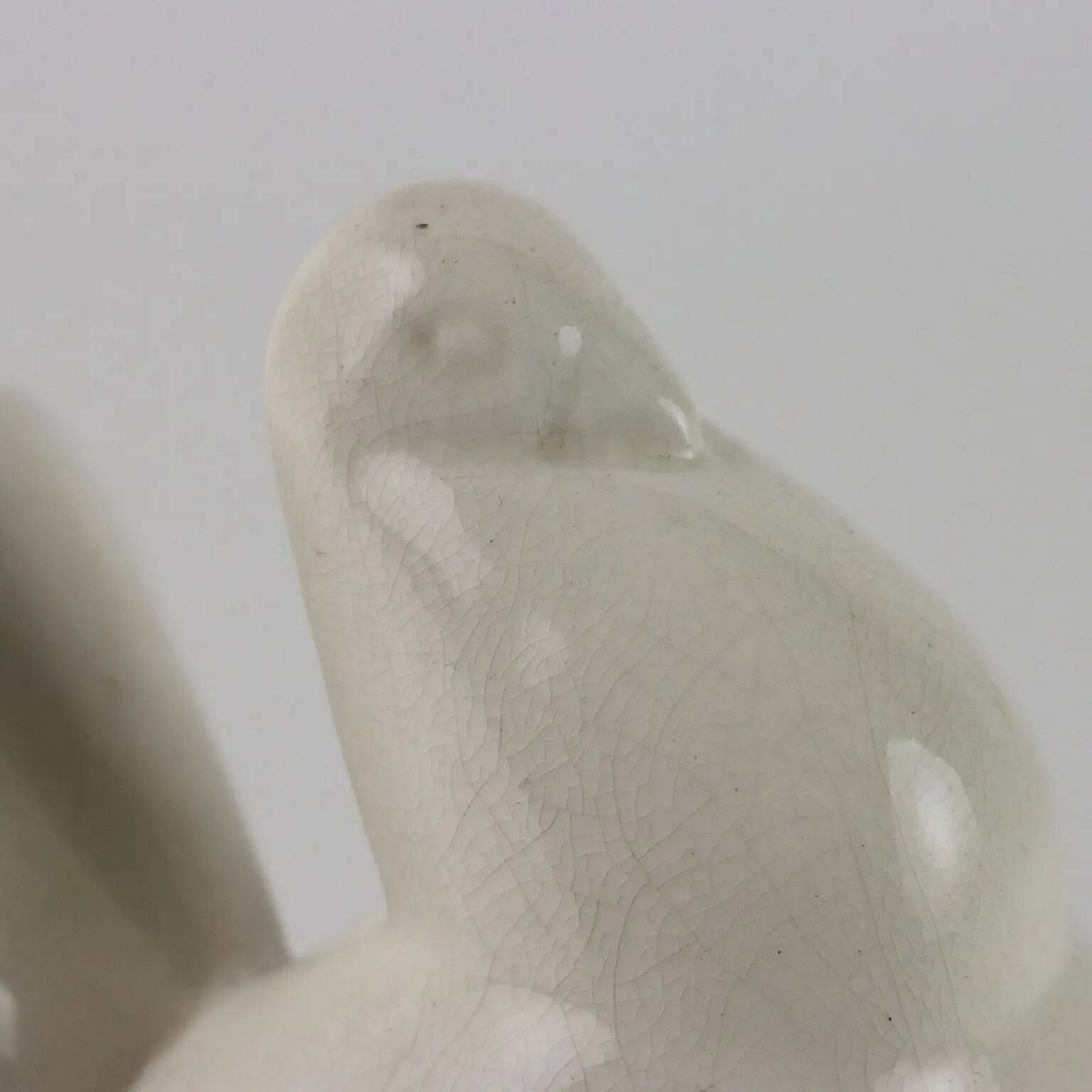Ancient ceramic pigeon sculpture by George Ventrillon for Saint Clément.