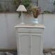 Small vintage buffet reimagined in pearl grey, wooden top.