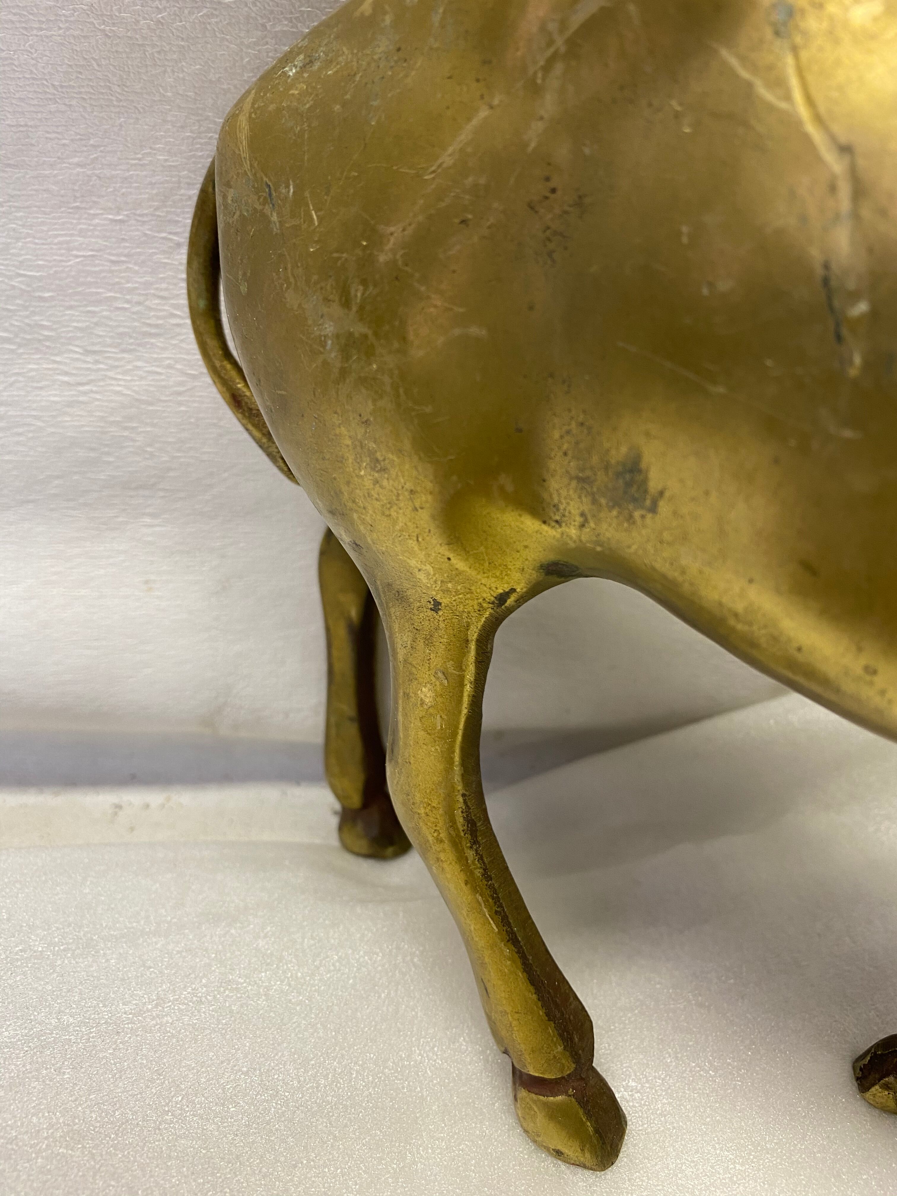 Brass buffalo figure