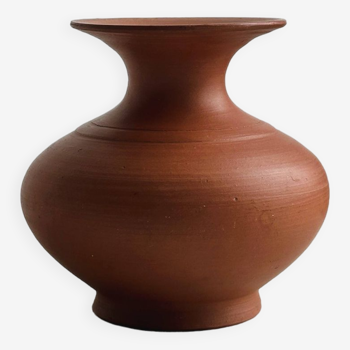 Handmade terracotta pottery vase.