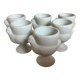 Six white hen egg cups