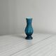 Small deep blue vase with reliefs
