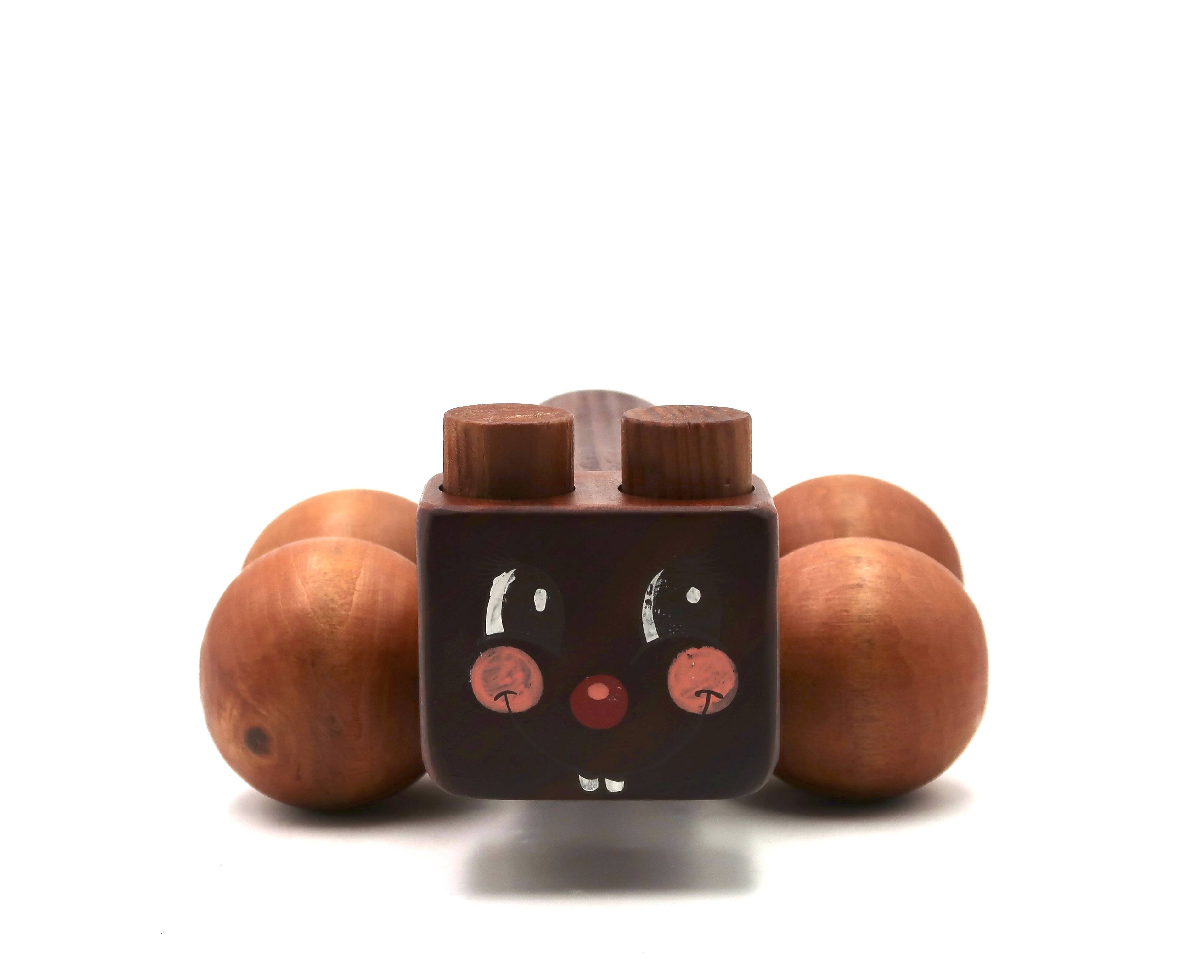 Wooden toy on wheels: caterpillar, 1970s