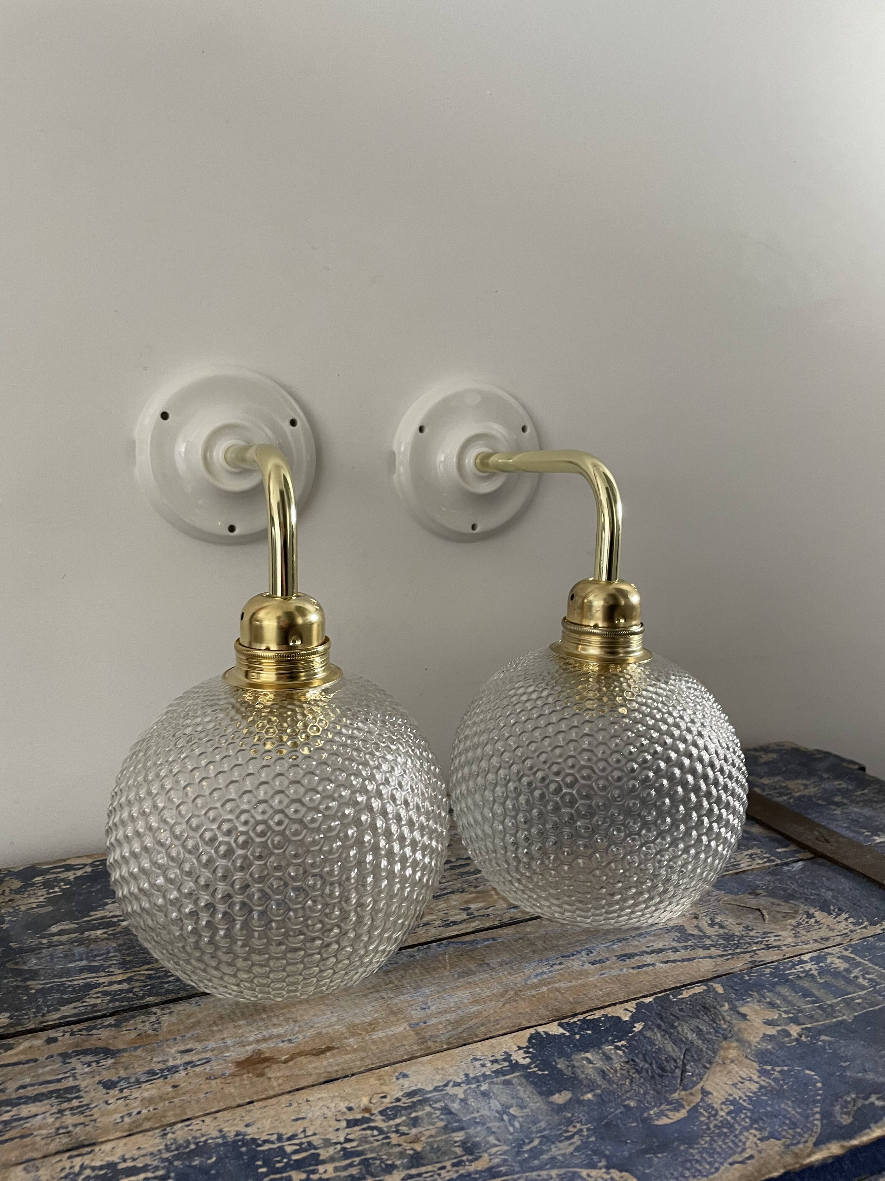 Pair of wall sconces glass globes