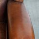 Large sheepskin wing chair with excellent colour and great seating comfort