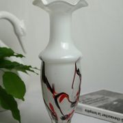 Corolla vase in white opaline with orange-brown patterns.