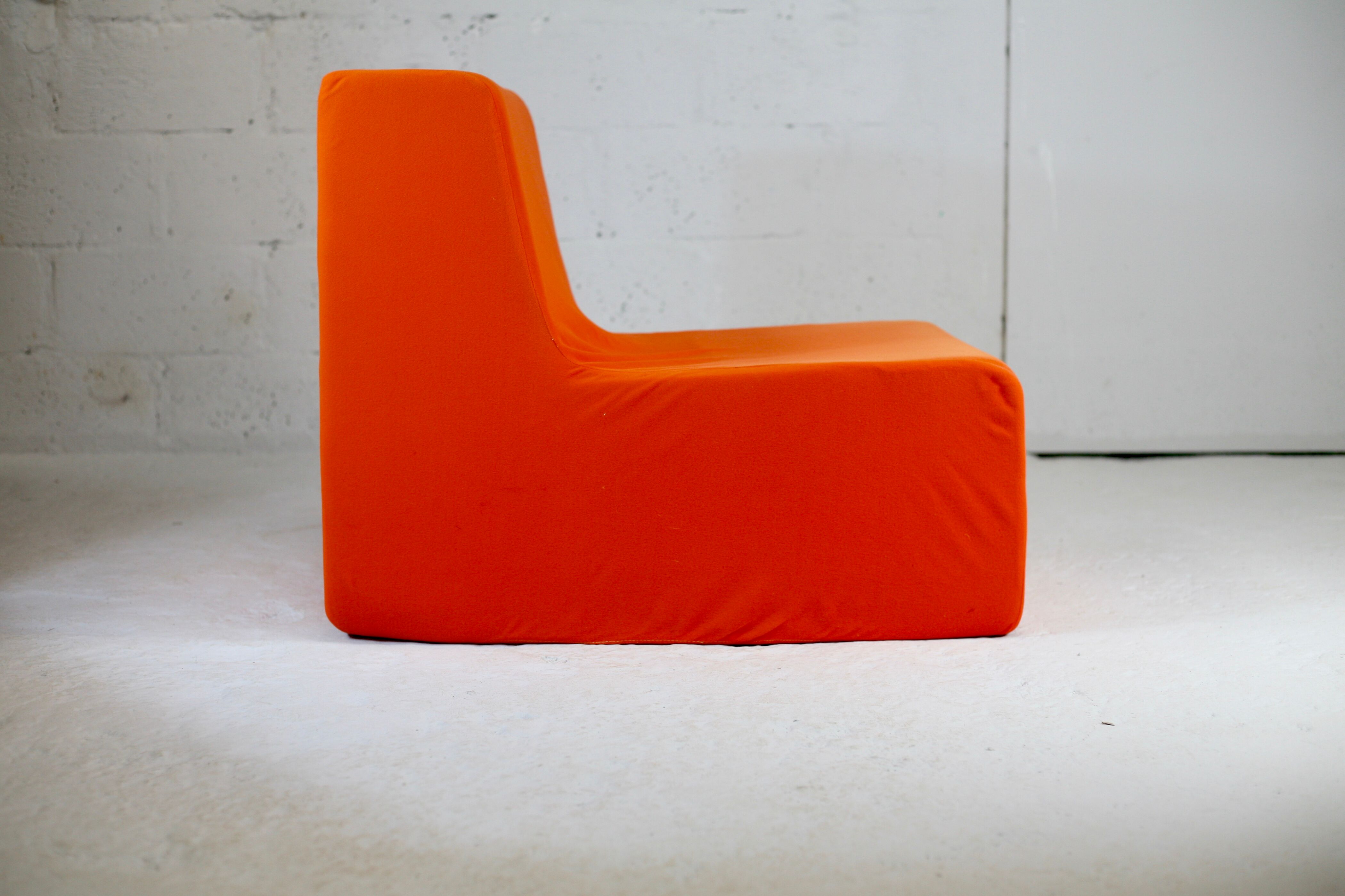 Armchair "space age" foam and orange jersey. Circa 1970