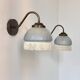 Pair of vintage wall lights in brass and blue-tinted glass, France 1970.