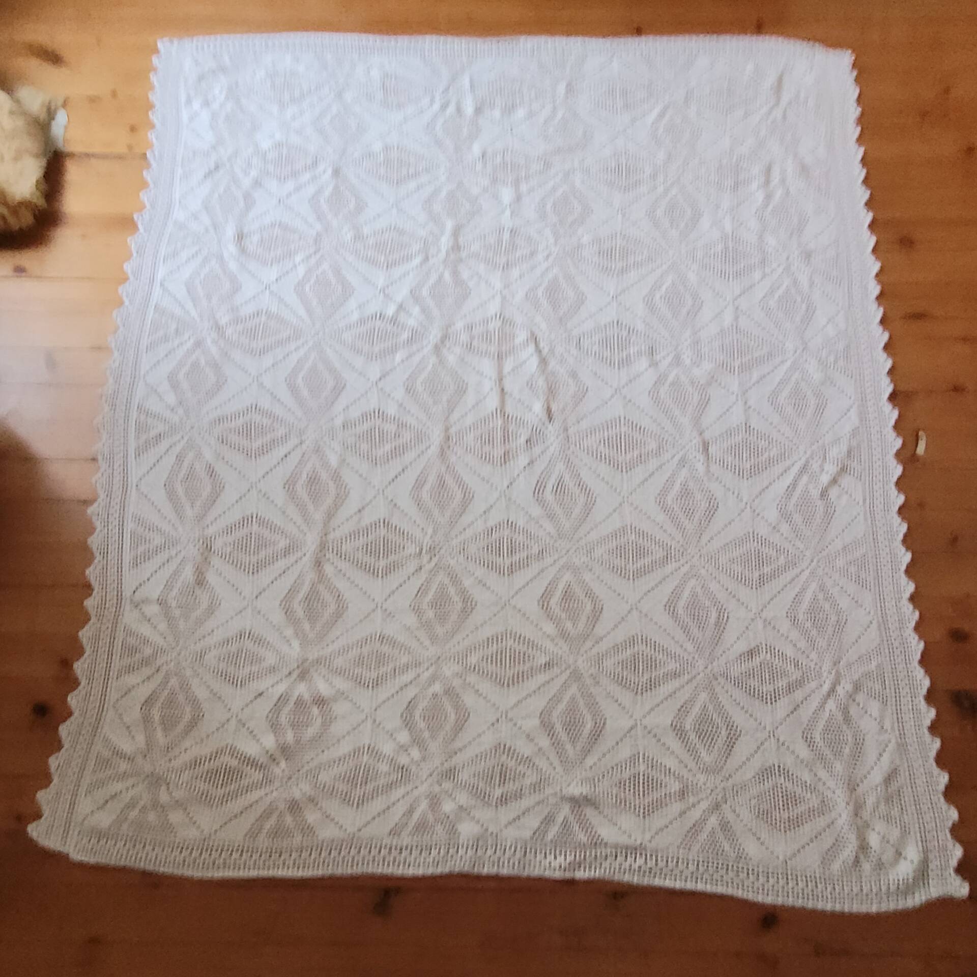 Large white crocheted bedspread