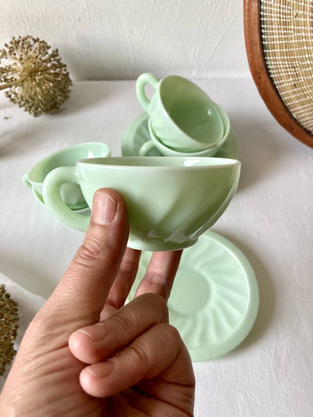 Pressed glass cups and saucers, 1950s