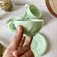 Pressed glass cups and saucers, 1950s