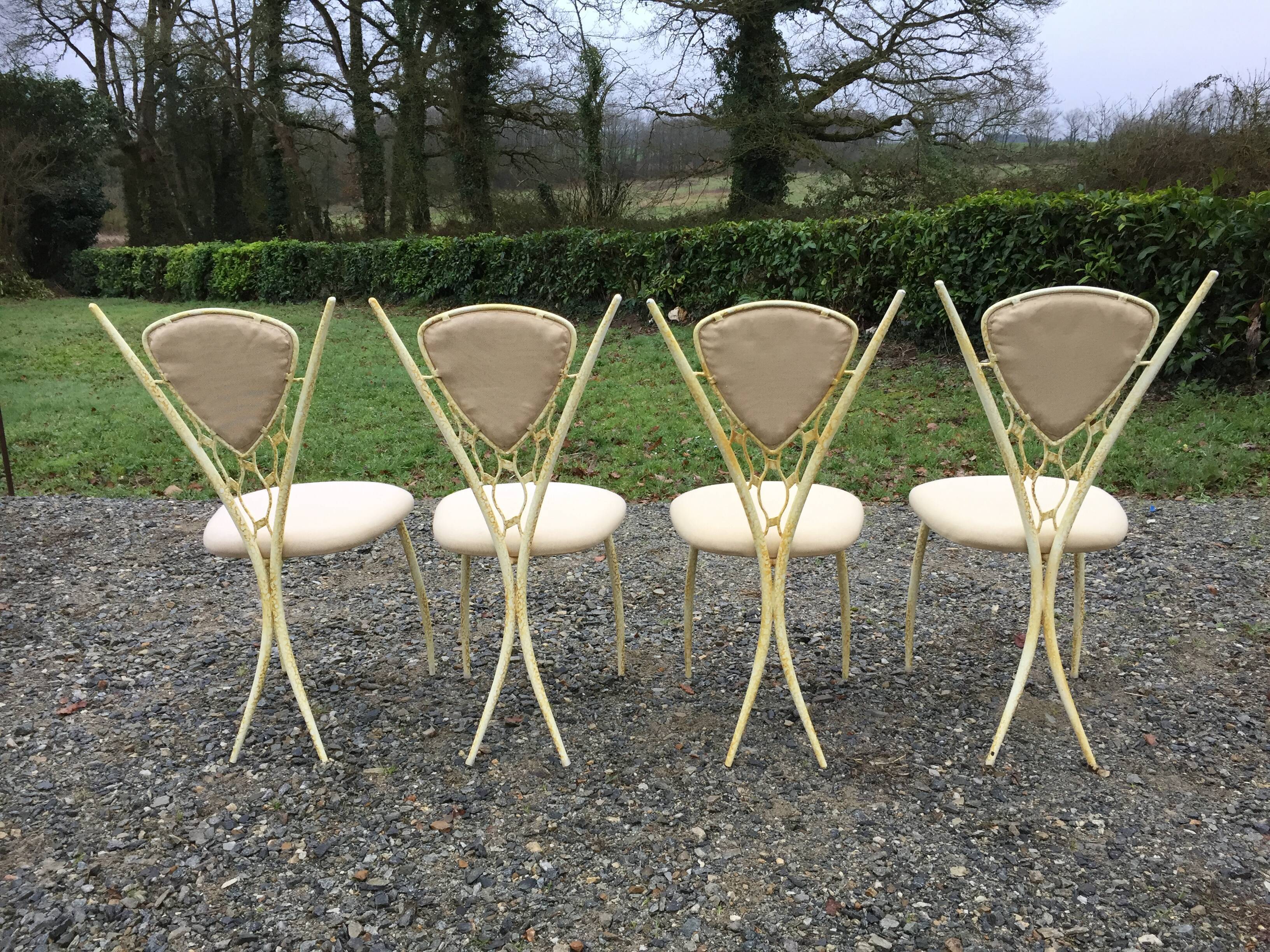 4 vintage chairs in tubular metal lacquered white yellow.