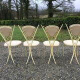 4 vintage chairs in tubular metal lacquered white yellow.