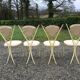 4 vintage chairs in tubular metal lacquered white yellow.