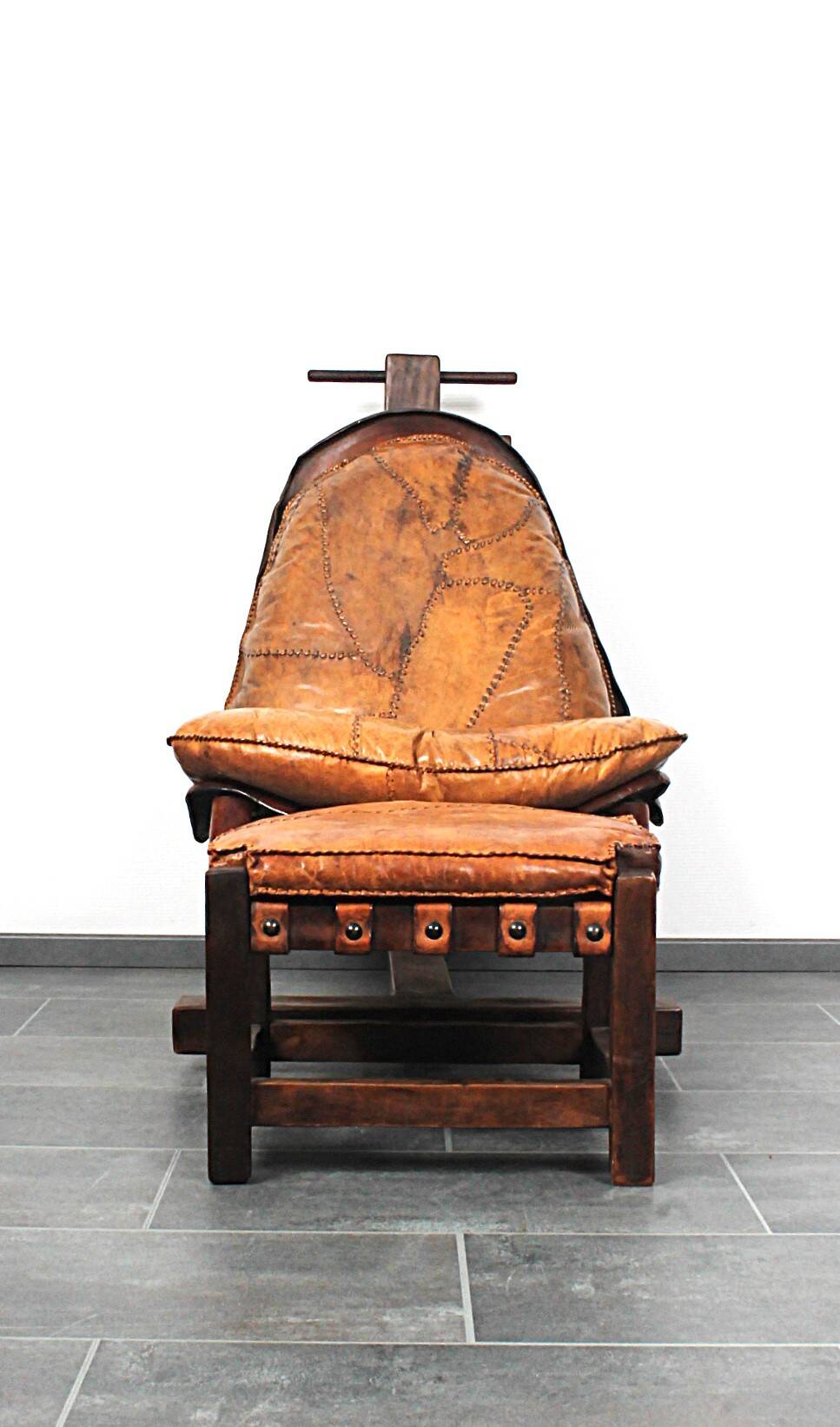 Brutalist oak lounge chair and ottoman, 1970s, set of 2