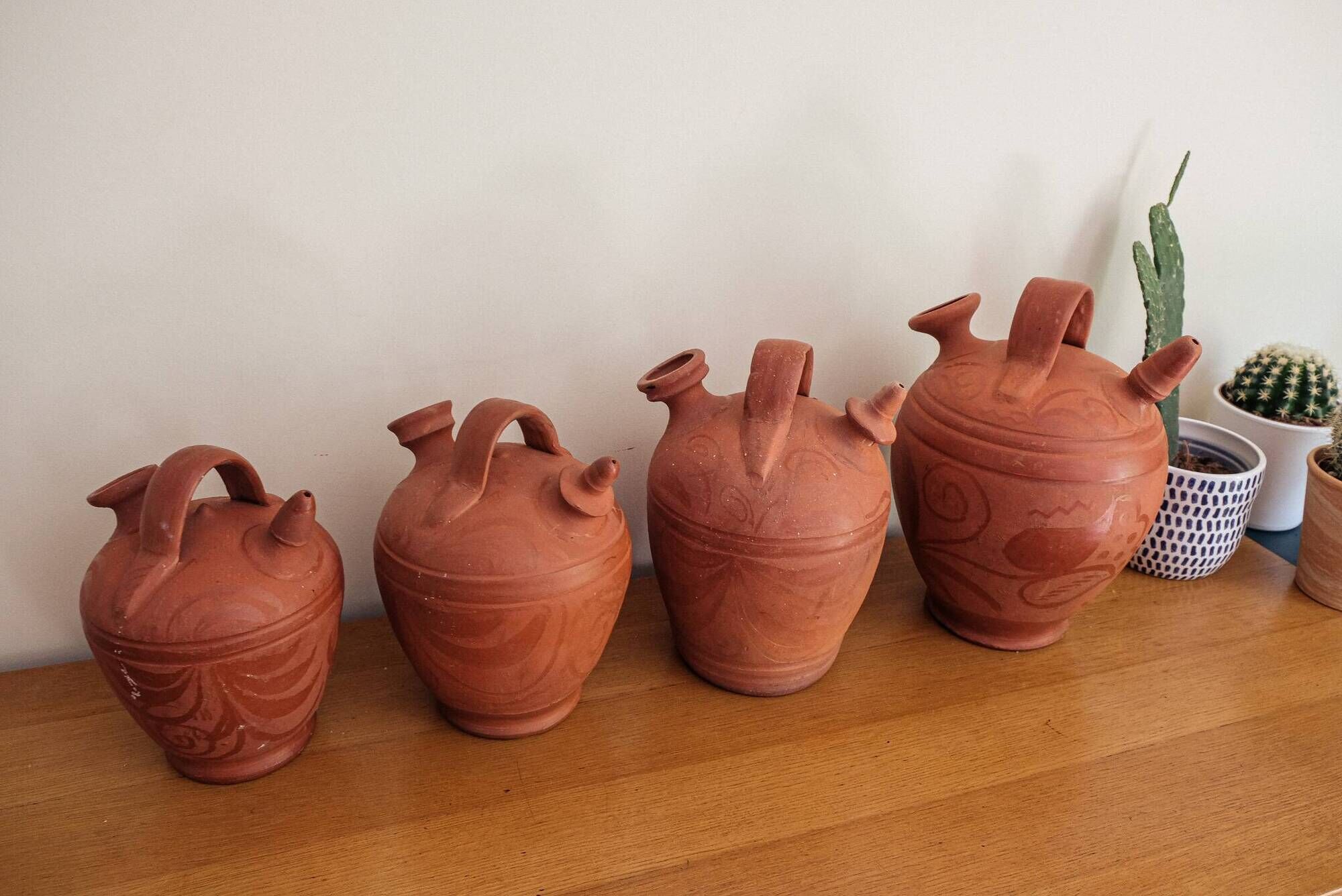 Set of 4 terracotta jugs