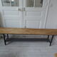 Bench metal structure and cross slate gray wood, waxed seat medium oak.