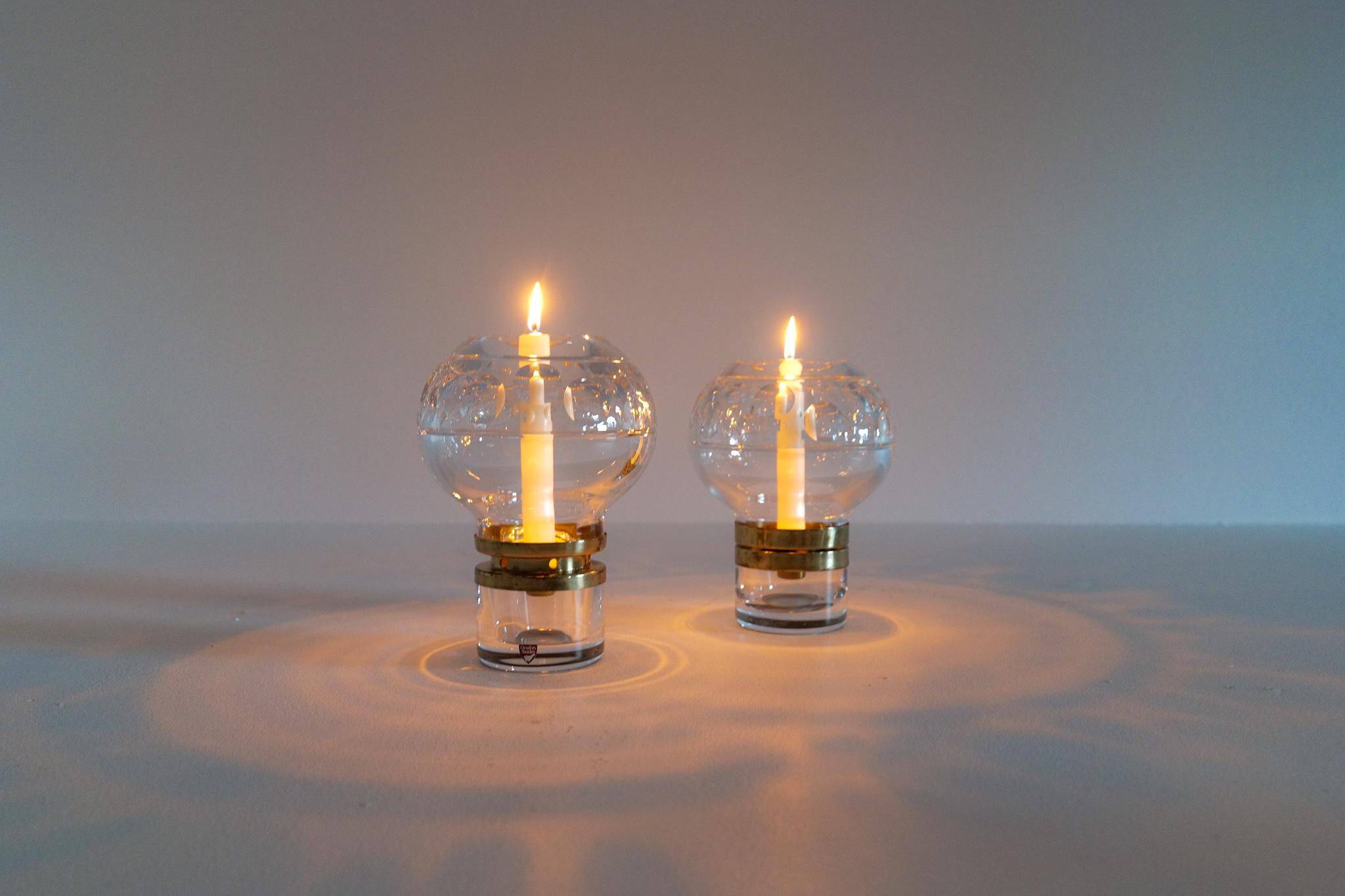 Pair of solid clear crystal candlesticks in modern Scandinavian style Orrefors Sweden