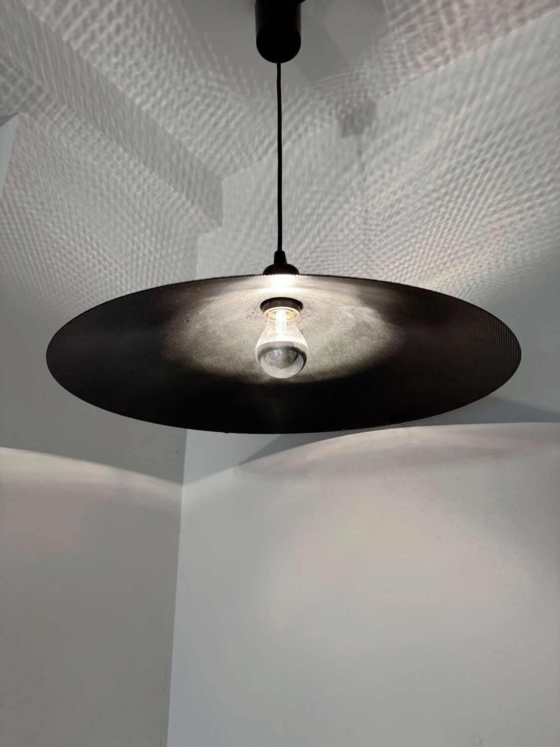 Metal micro-perforated suspension from the 1960s.