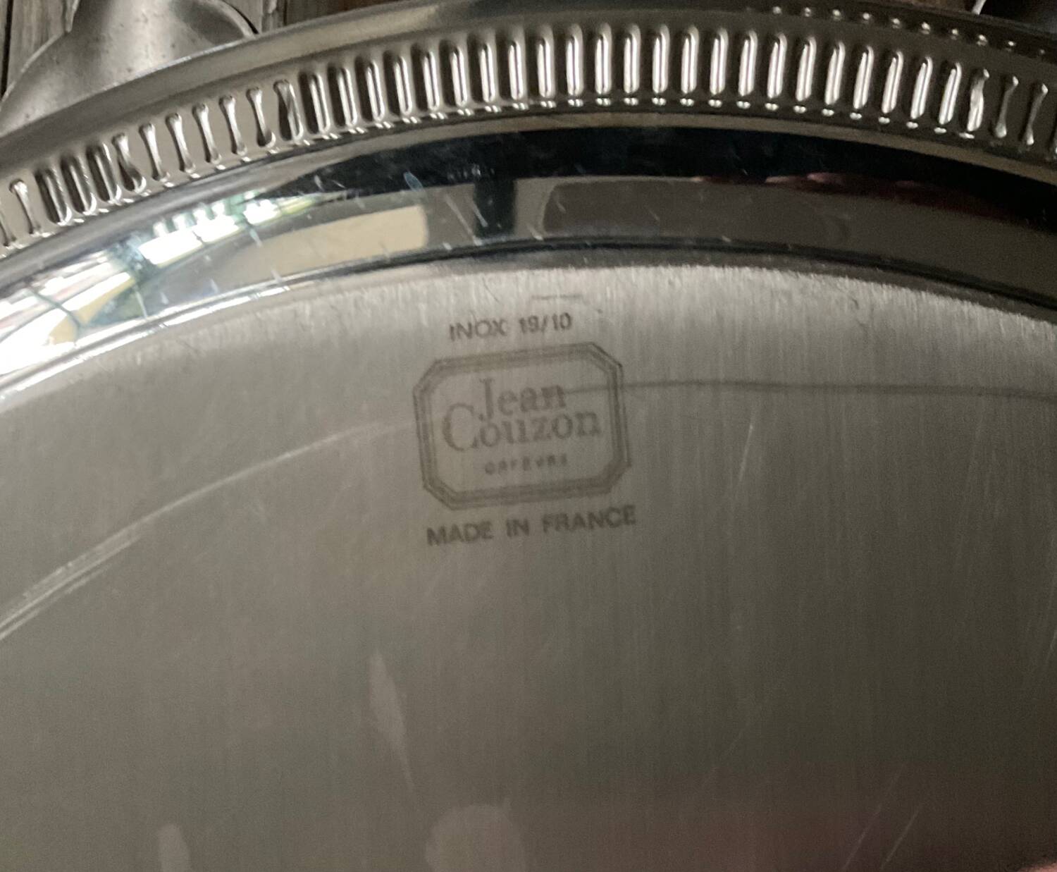 Vintage stainless steel plateau by Jean Couzon.