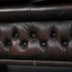 Dark brown cow leather vintage 2-seater Chesterfield sofa in English style