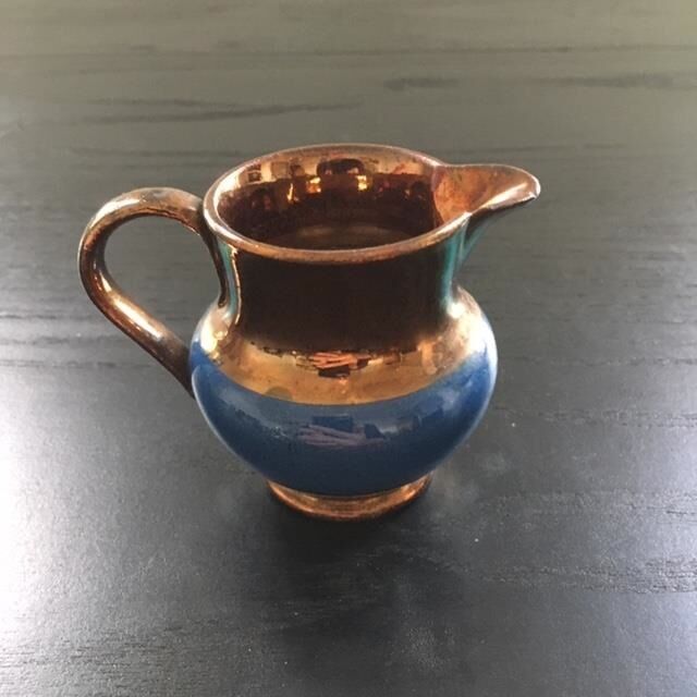 Two-tone copper and blue pitcher