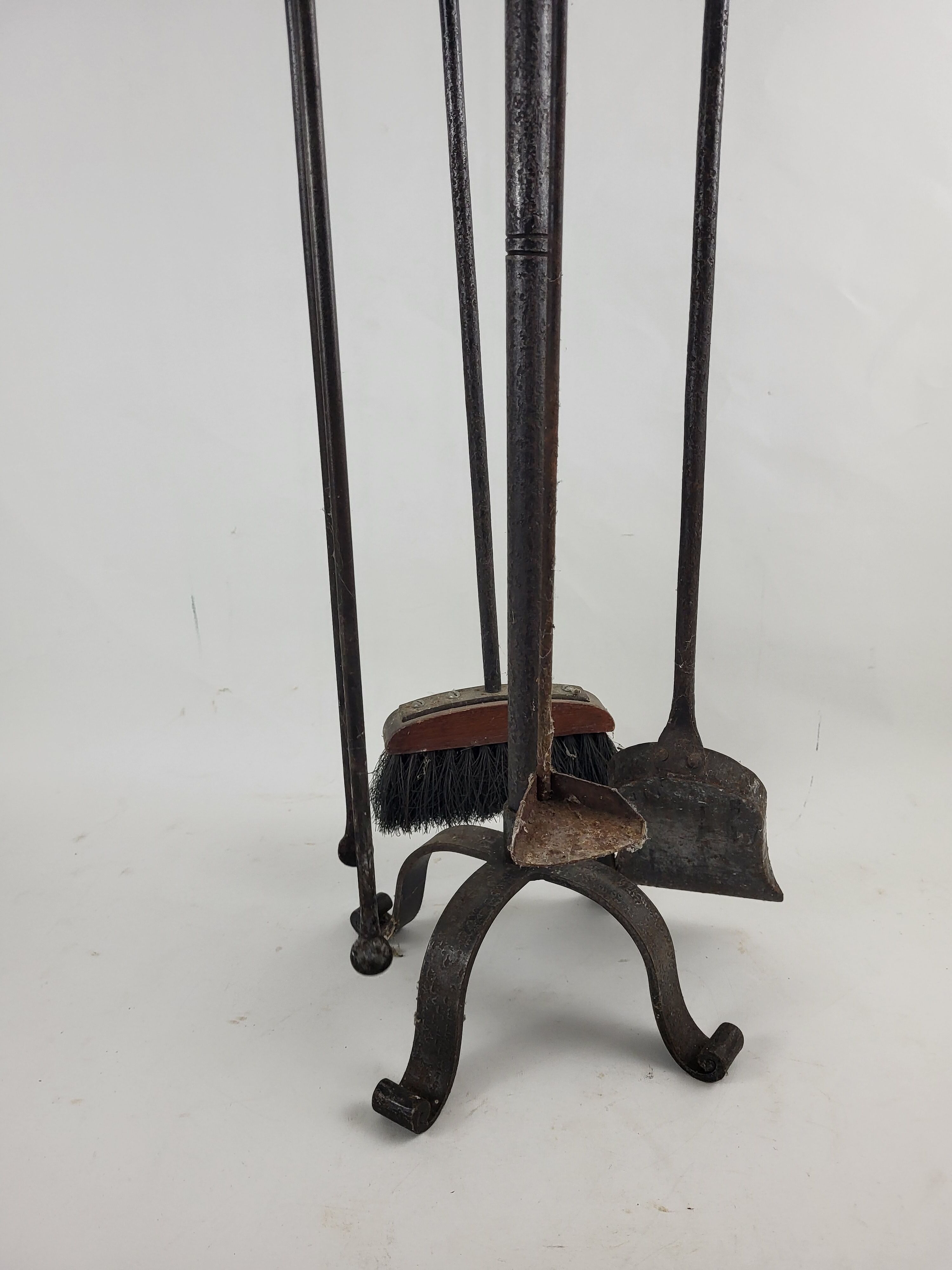 Wrought iron fireplace servant