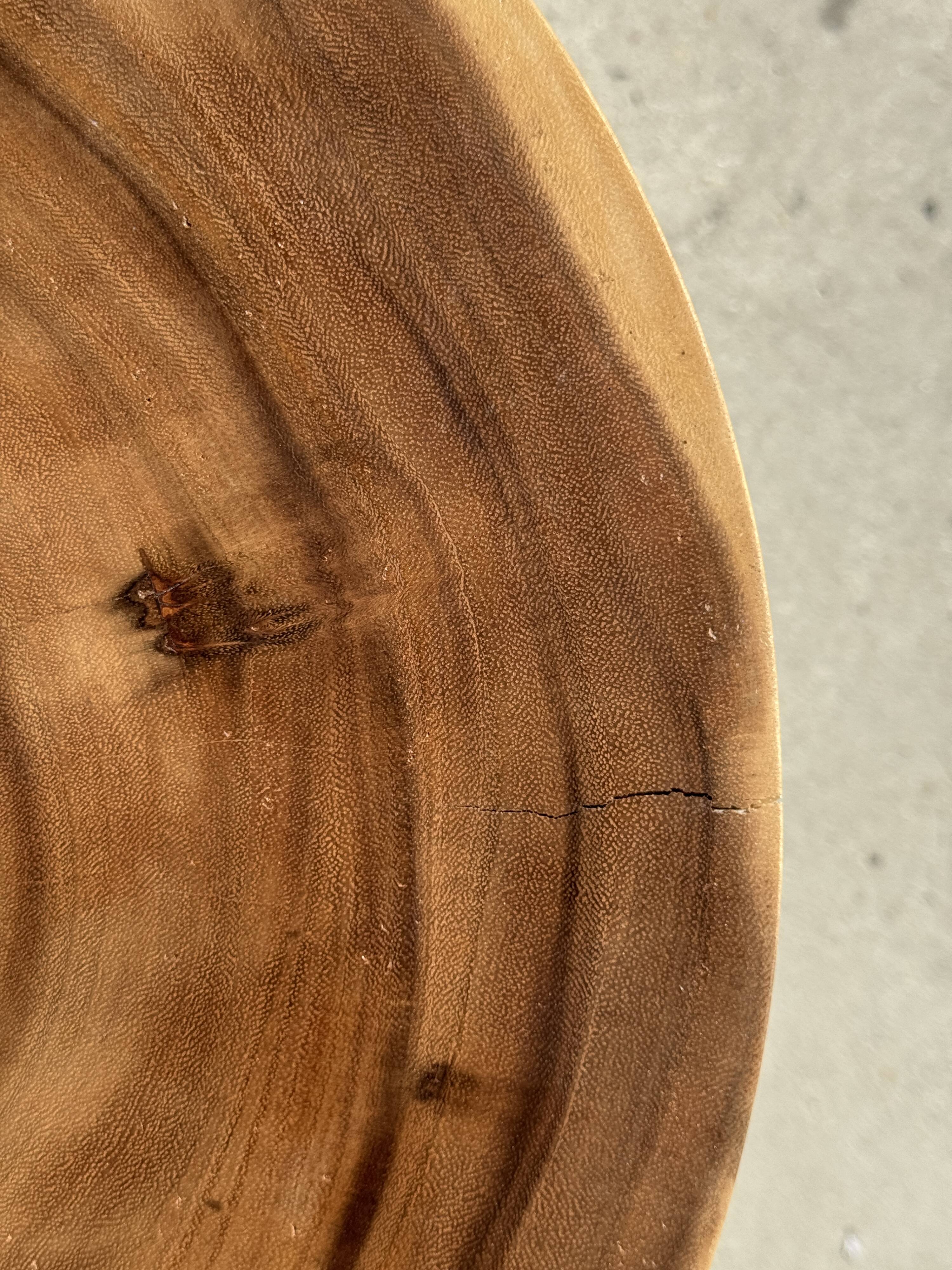 Natural solid suar side table (monoxyle) with a minimal conical base.