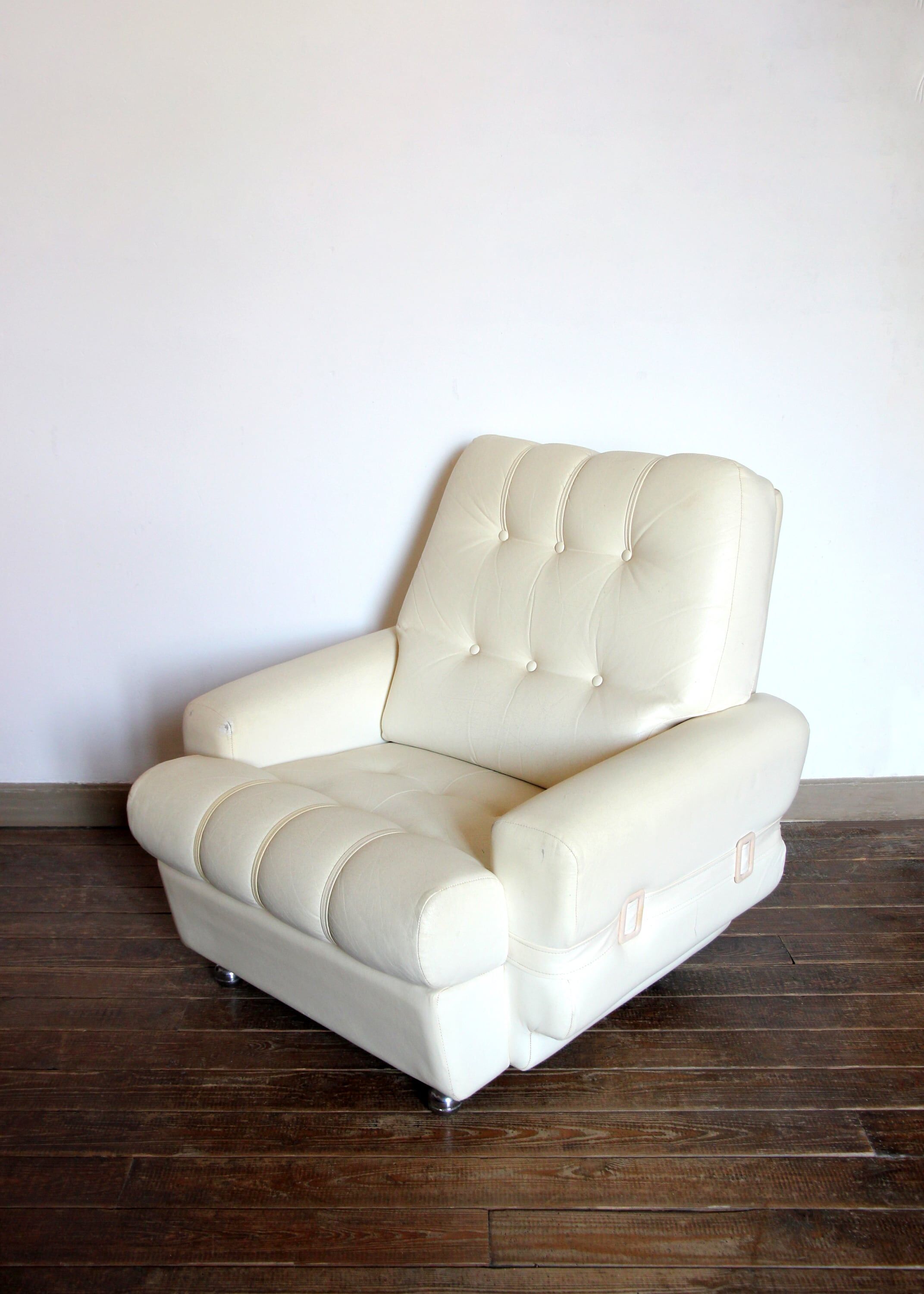 Seventies armchair in cream white skaï