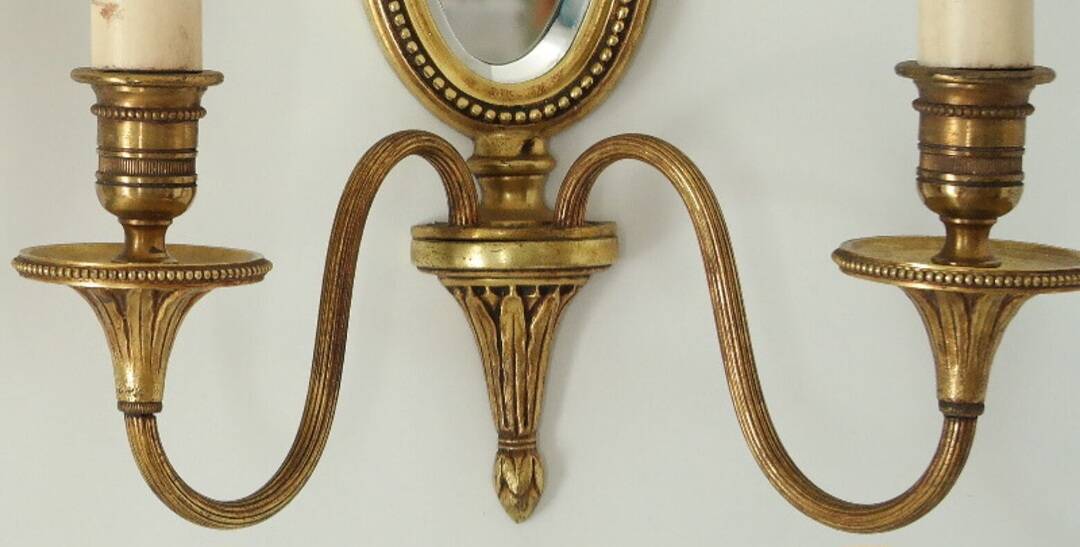 Paire d'appliques en bronze style Louis XVI Lucien Gau