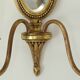 Paire d'appliques en bronze style Louis XVI Lucien Gau
