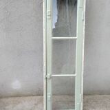 Old window mounted as a fenestron