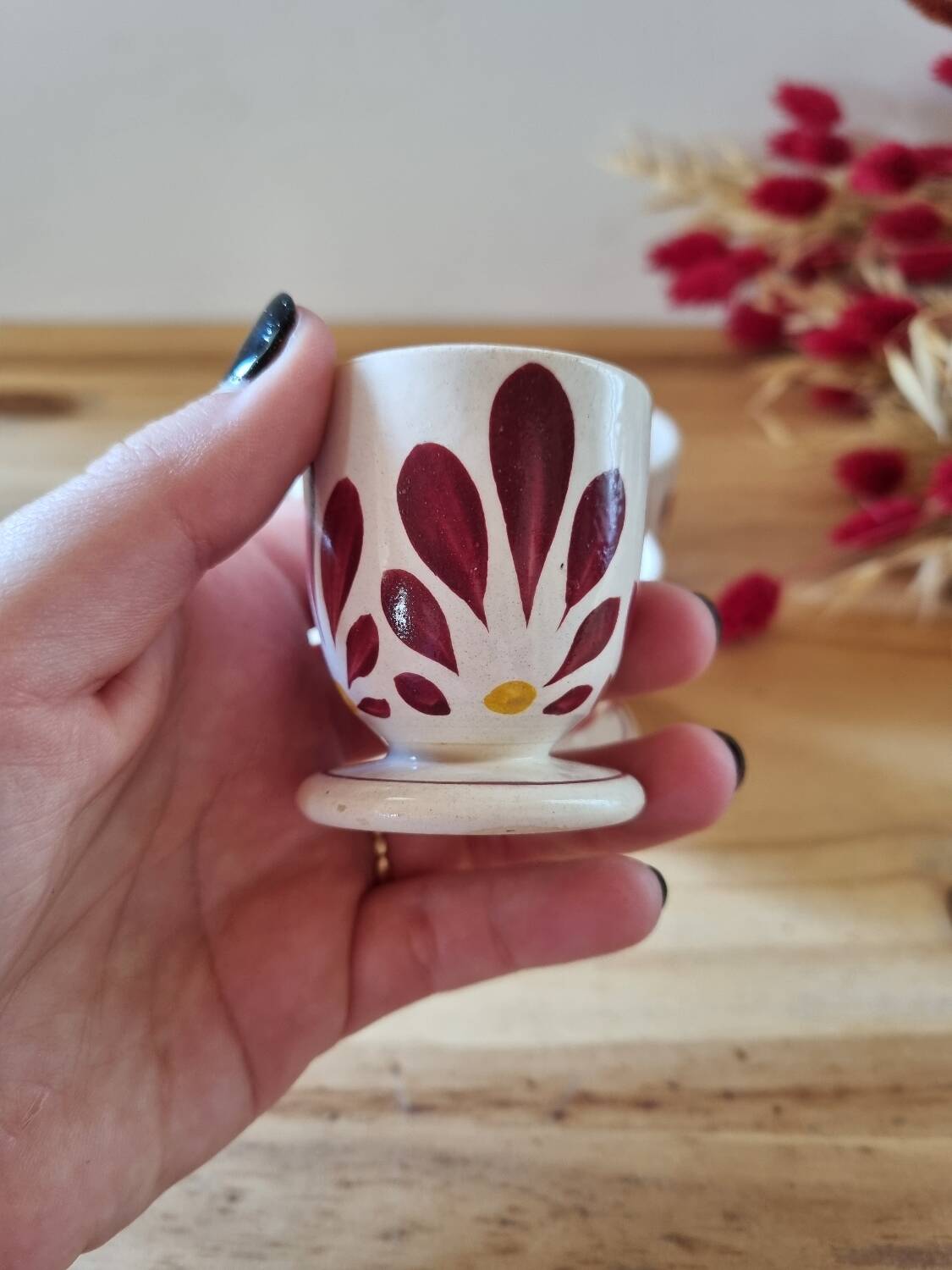 Set of four Digoin-style egg cups