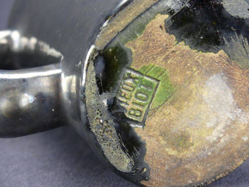 Old Biot, modernist pitcher in iridescent black ceramic.