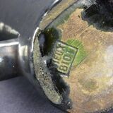 Old Biot, modernist pitcher in iridescent black ceramic.