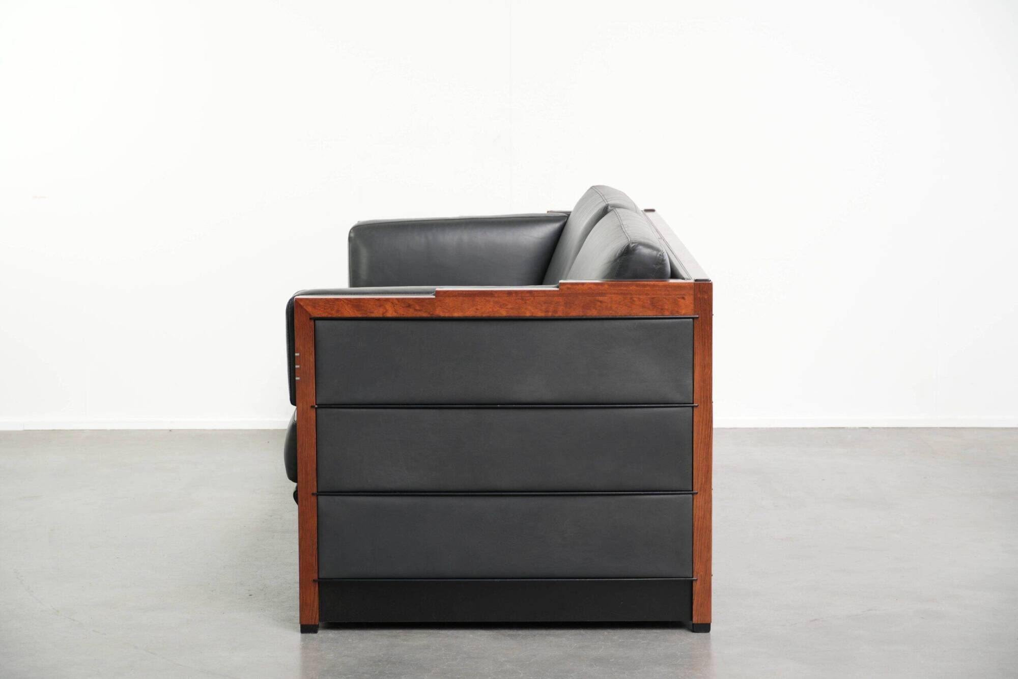Timeless 3-seater Art Deco design sofa  upholstered in black cowhide leather
