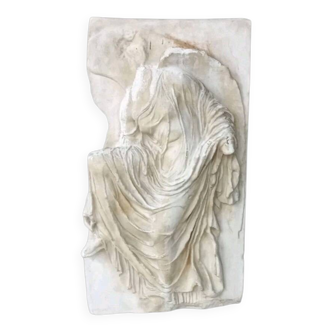 Ancient bas-relief plaster sculpture of the Goddess Nike