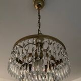 Cascade chandelier with crystal and brass tassels