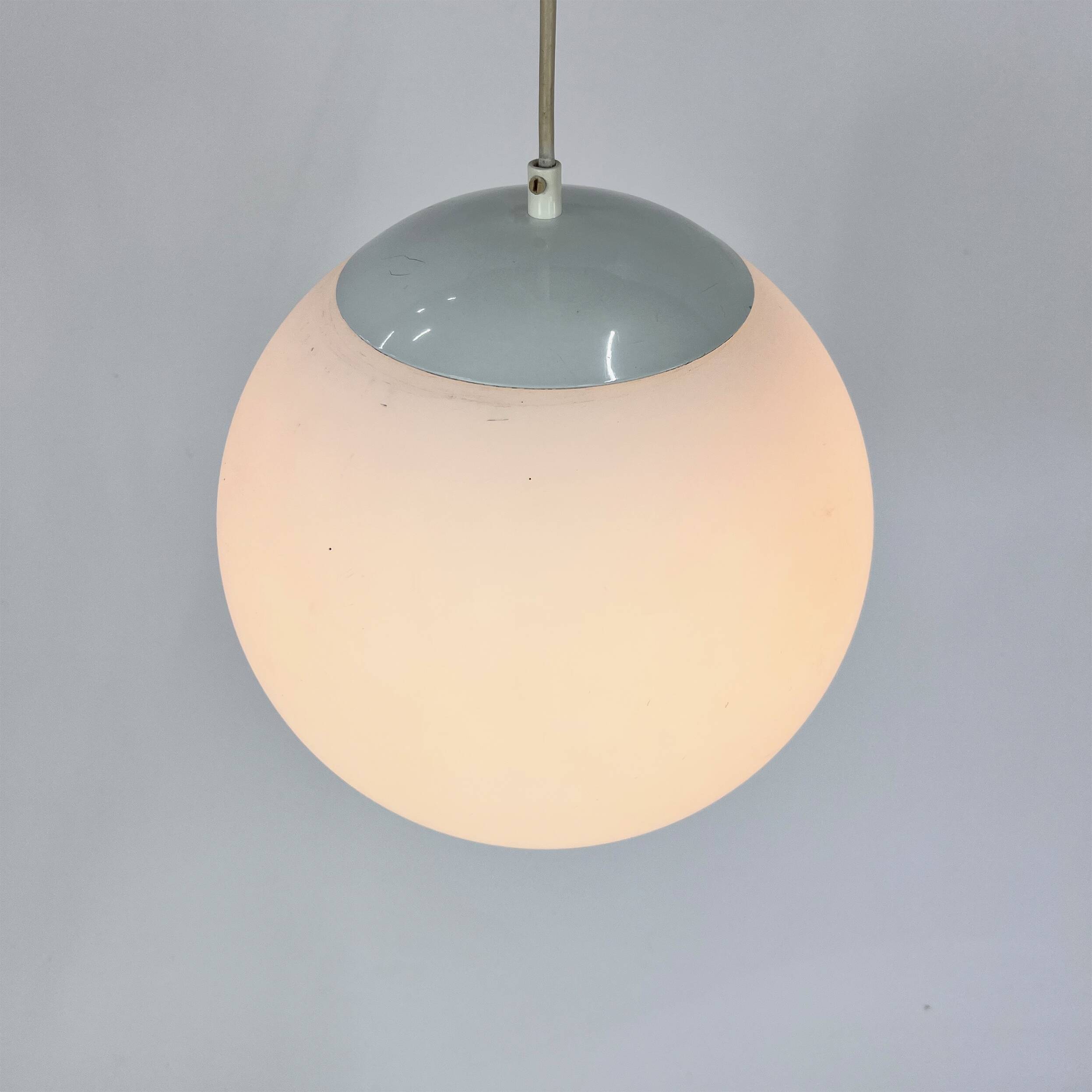 Vintage glass hanging ball lamp by hala zeist, 1960s