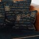 Canapé 2,5 places en cuir d'agneau et coussins en tissu