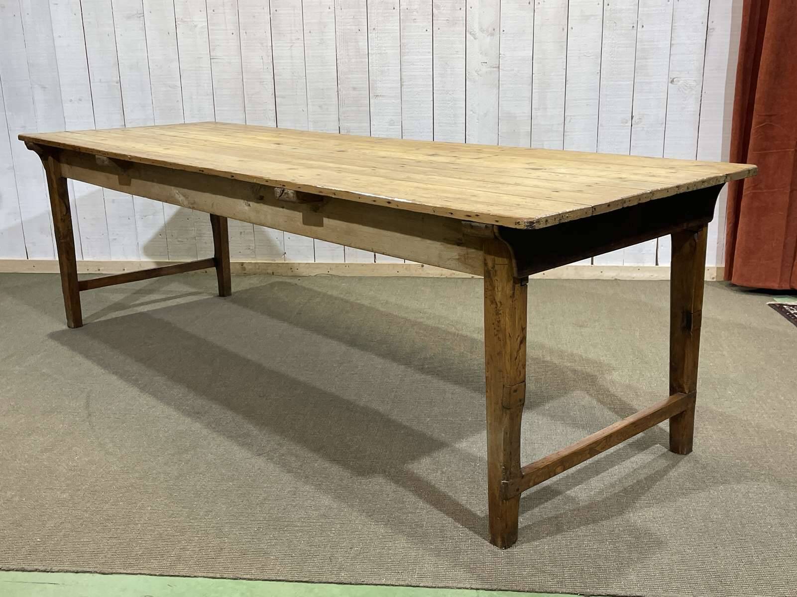 Early 20th-century farmhouse table made of fir, elm, and chestnut.