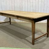 Early 20th-century farmhouse table made of fir, elm, and chestnut.