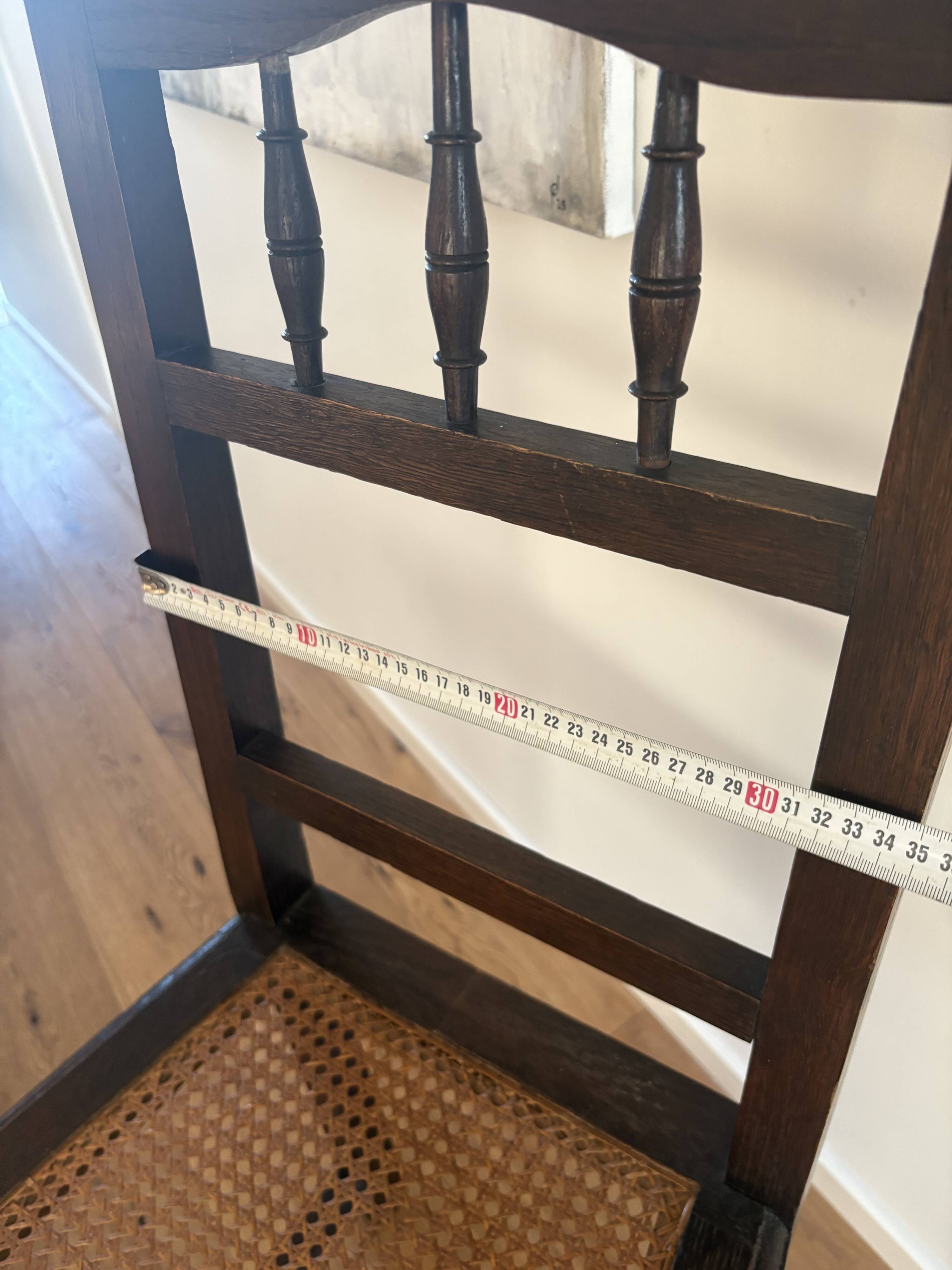 Lot of 4 solid oak chairs with caning in the Henri II style.