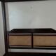Exotic wood four-poster bed colonial style with rattan headboard