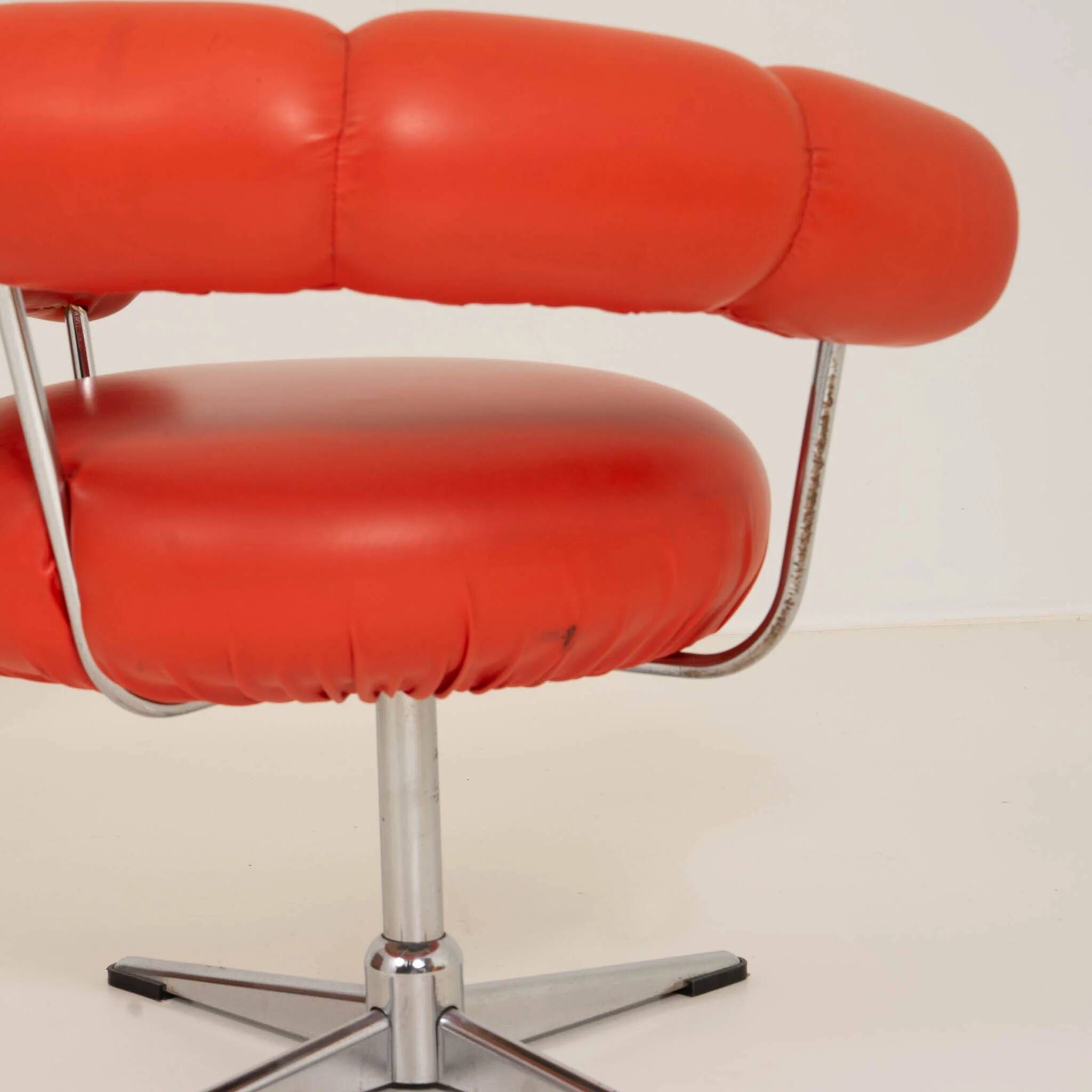 Vintage orange faux leather chair