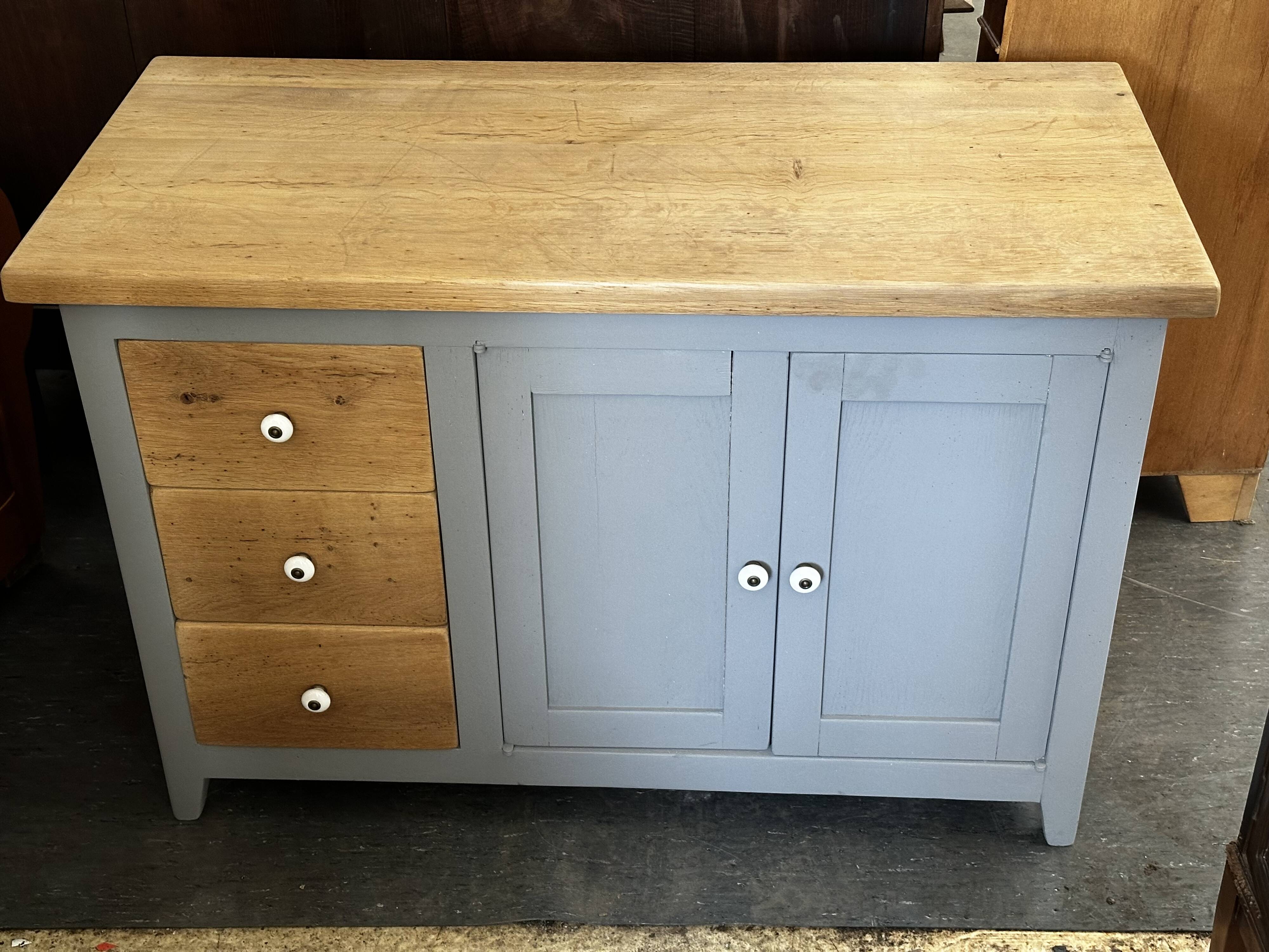 Vintage sideboard painted in gray and raw wood